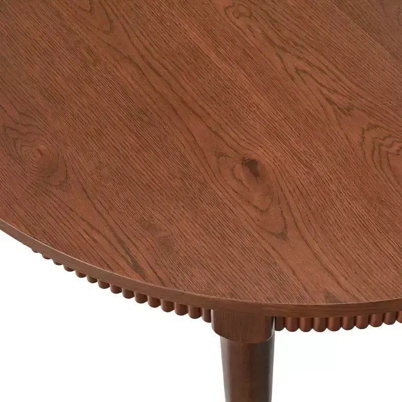 Table de salle à manger avec tablier rond cannelé