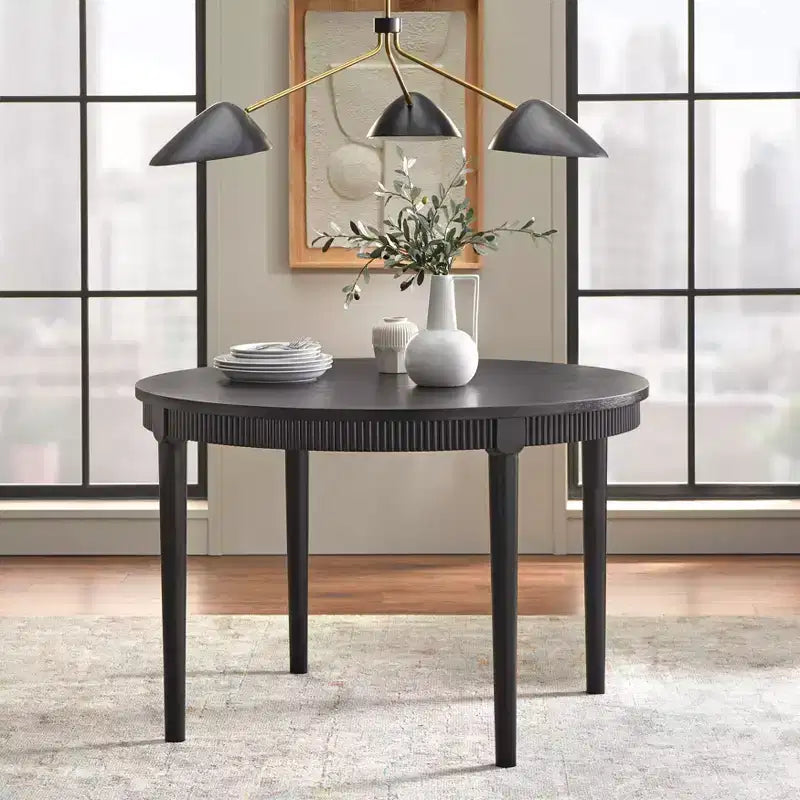 Table de salle à manger avec tablier rond cannelé