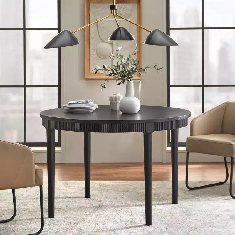 Table de salle à manger avec tablier rond cannelé