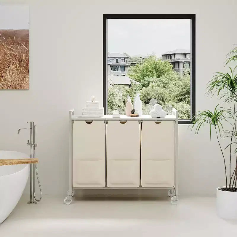 Panier à linge avec étagère et 3 sacs amovibles, trieur à linge roulant de 120L avec cadre métallique pour salle de bain